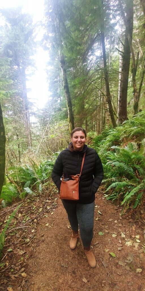 Picture of Ariel Zimmer hiking on a forest trail